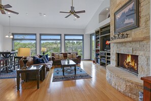 Open living space with wood burning fireplace