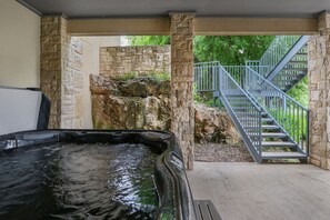 Covered hot tub on the patio