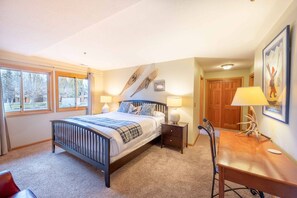 The primary suite is filled with natural light! Guests will find a King bed with a high end mattress, and it features full sized closets.