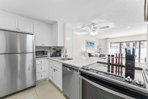 Enjoy cooking in this brand new (June, 2018) kitchen (new cabinets, quartz counters, new stainless appliances).