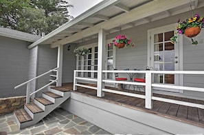 The breezy covered porch will quickly become your favorite place to unwind.
