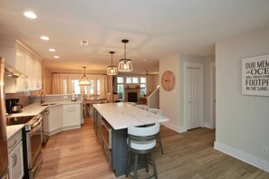 Beautifully remodeled open kitchen, dining room and living room.