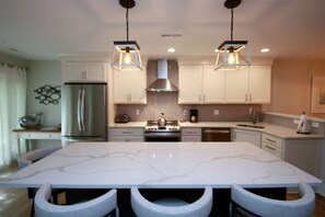 Spacious kitchen with upgraded appliances and gorgeous appointments.