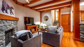 Main Floor - Living Room With Wood Burning Fireplace