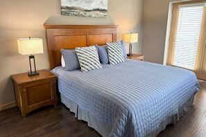 Master bedroom features a comfortable King sized bed and wonderful views!