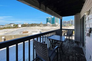 Private balcony with table seating for al fresco dining.