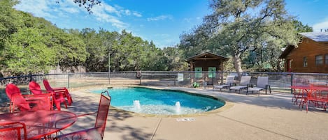 Large resort swimming pool with loungers