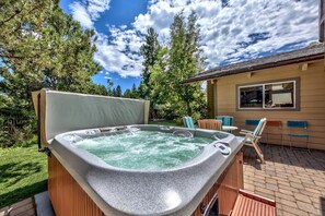 Private hot tub in beautifully maintained backyard