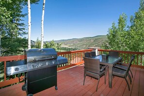 Enjoy outdoor meals and wonderful views on the large main level deck.