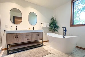 Spa-Like Serenity! Newly Renovated Primary Bathroom with Freestanding Tub, Modern Double Vanity, and Walk-In Shower.
