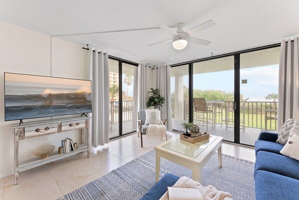 Bright and airy living space with natural light flowing into the unit.