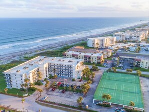 Stunning aerial view of the property, located just 1.2 miles north of Cocoa Beach Pier!
