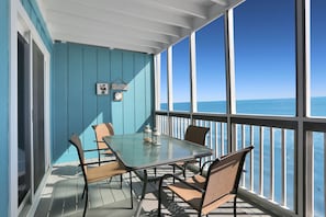 Dining on Gulf Front Screened Deck