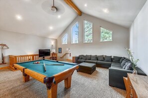 Huge loft upstairs with pool table and TV