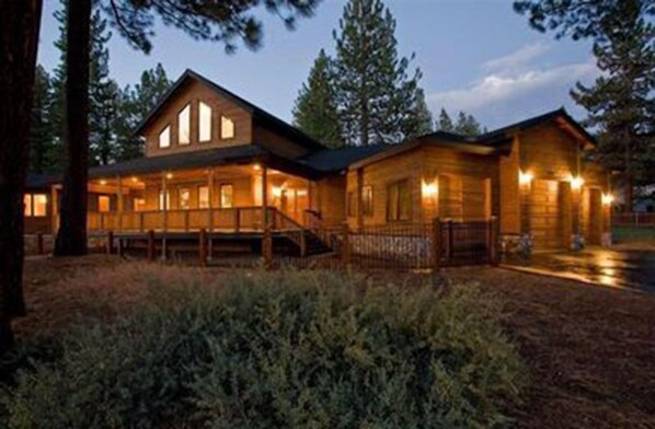 Front of home at Dusk - Expansive estate with four bedrooms and over 4000 square feet of living space