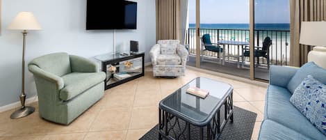 Living Room - Enjoy relaxing evening in your three bedroom vacation spot as you watch a breathtaking sunset.