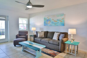 Comfortably Furnished Living Room with Queen Size Sleep Sofa