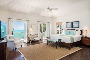 The primary suite has a king bed, bathroom, and balcony.