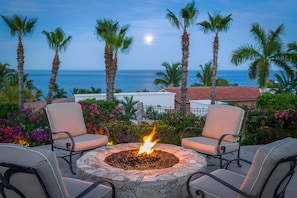 Gather around the luxury fire pit with a picturesque view of the Sea of Cortez