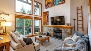 Main Floor - Living Room With Wood Burning Fireplace