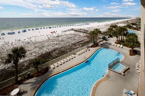 Balcony view - Featuring the property's large pool!