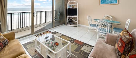 Living Room - The living room view of the gulf is very nice from this third-floor, one-bedroom unit.