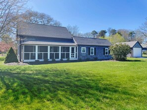 Side view of the home, encompassing a spacious corner lot - 38 Pleasant Street Harwich Port Cape Cod New England Vacation Rentals