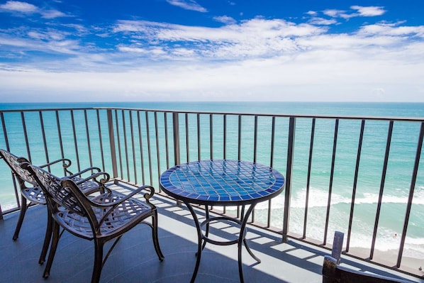 Your morning coffee and evening refreshments will be a special treat here. This is not a model unit.