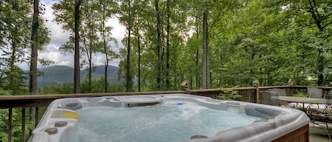 Soak in the Hot Tub with a beverage of your choice