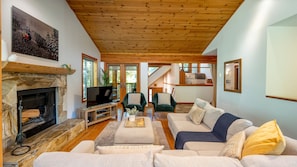 Main Floor - Living Room With Wood Burning Fireplace