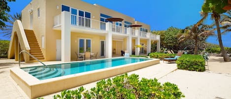 Welcome to Villa Caymanas featuring stunning architectural details and a oceanfront private pool.