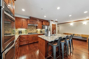 Island with sink, counter space, easy conversation while cooking