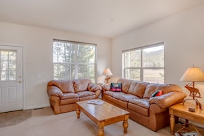 Living room...with lovely tree, valley and mountain views!