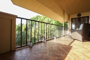 Large diagonally designed tile and lanterns on balcony w/access from LR & master BR