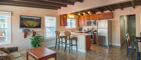 Inside photo showing the kitchen and family room area