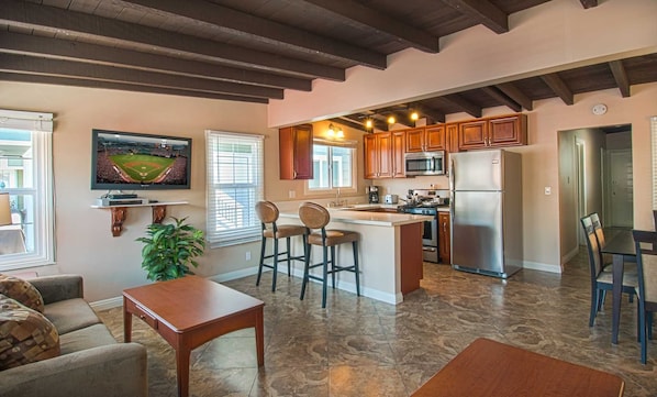 Inside photo showing the kitchen and family room area