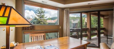 Bright And Cheerful Large Windows with Mountain Views, Sliding Glass Doors Access Private Deck