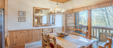 Our comfortable dining room offers plenty of seating and gorgeous mountain views. There is seating for 6-7 at the table and additional seating at the
