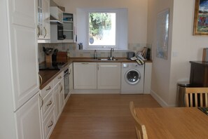 The kitchen has all mod cons incuding dishwasher