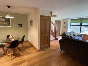 View from kitchen to seating area in the Stables