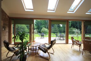 The sunroom looking out over the patio