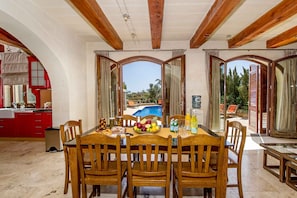 Dining area of The Almonds Holiday Home