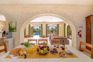 Dining room of Gozo farmhouse with pool