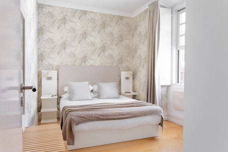 Quiet and luxury bedroom with a comfortable queen size bed