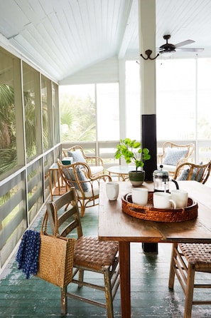 You'll love breakfast (or dinner) on the porch, catching all the Tybee breezes!