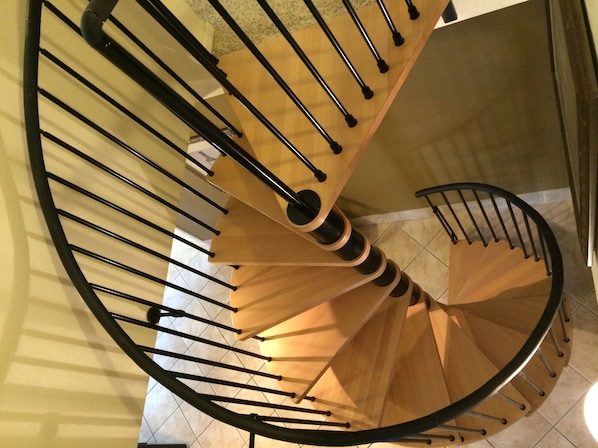 Imported spiral staircase from Italy to access the loft (second bedroom)