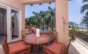 Balcony with view of the beach club. Enjoy the proximity to everything. This condo is located walking distance to beach club, marina village, Marriott Hotel.