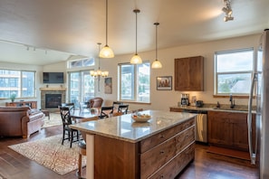 Open floor plan flows in the main living space into the dining area and kitchen