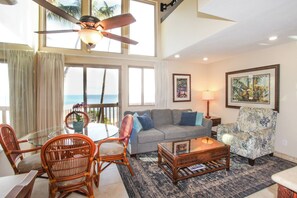 A8 Kihei Sands Beachfront Condominiums - Living area couch is also a sleeper sofa for extra sleeping arrangements.