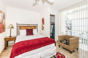 Queen Bedroom with a Spacious Closet for Clothes and Storage